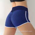 Ventas de fábrica de cintura alta jacquard nido de abeja medias de burbuja pantalones de fitness pantalones cortos deportivos leggings yoga pantalones cortos para correr mujeres